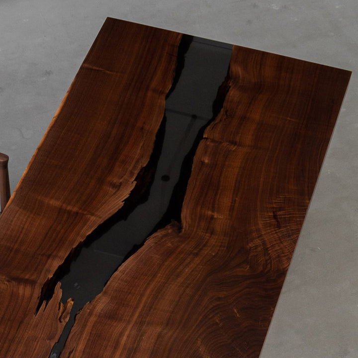 Custom epoxy and walnut boardroom table featuring straight edges and elegant matte finish