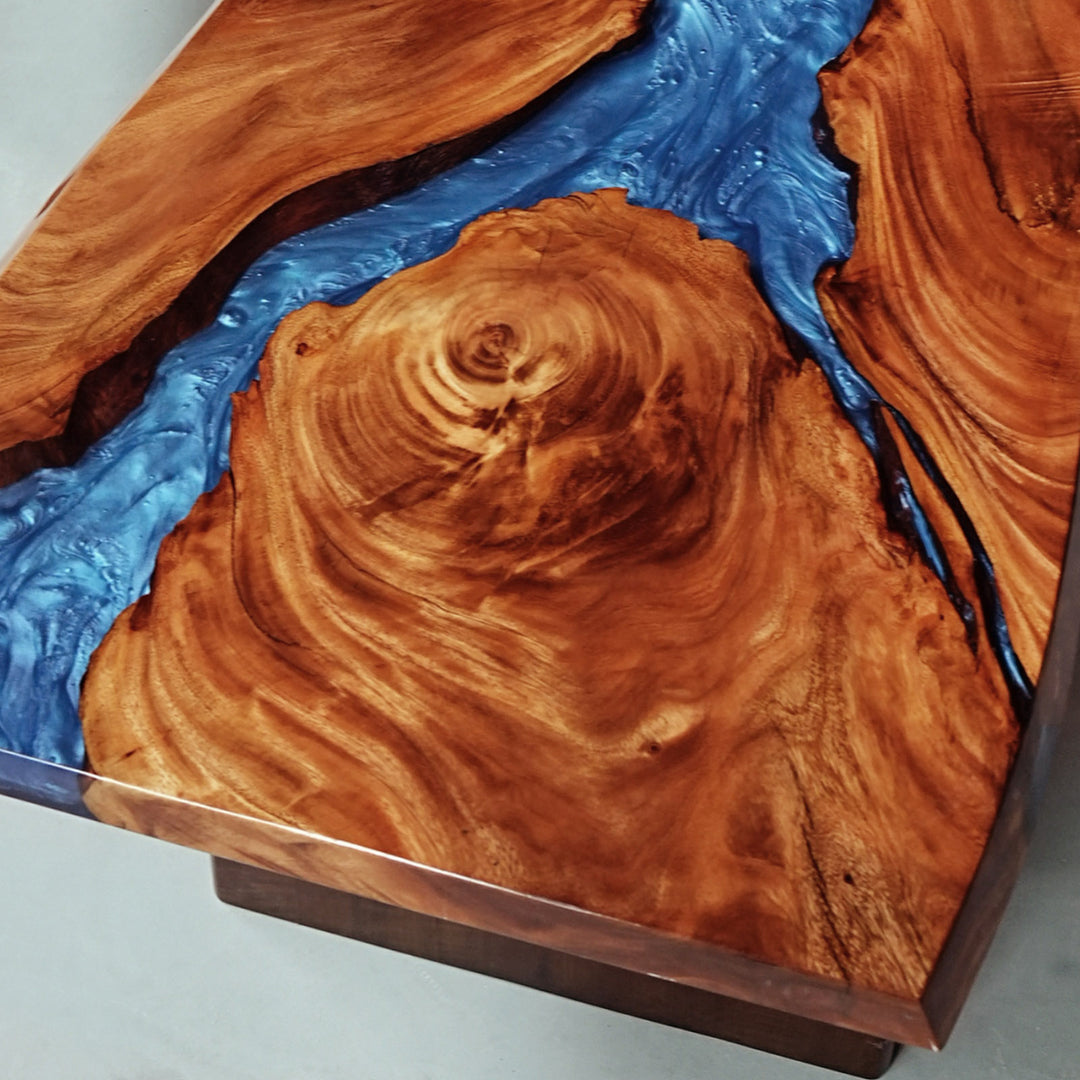 Large epoxy river table for modern coastal home interiors