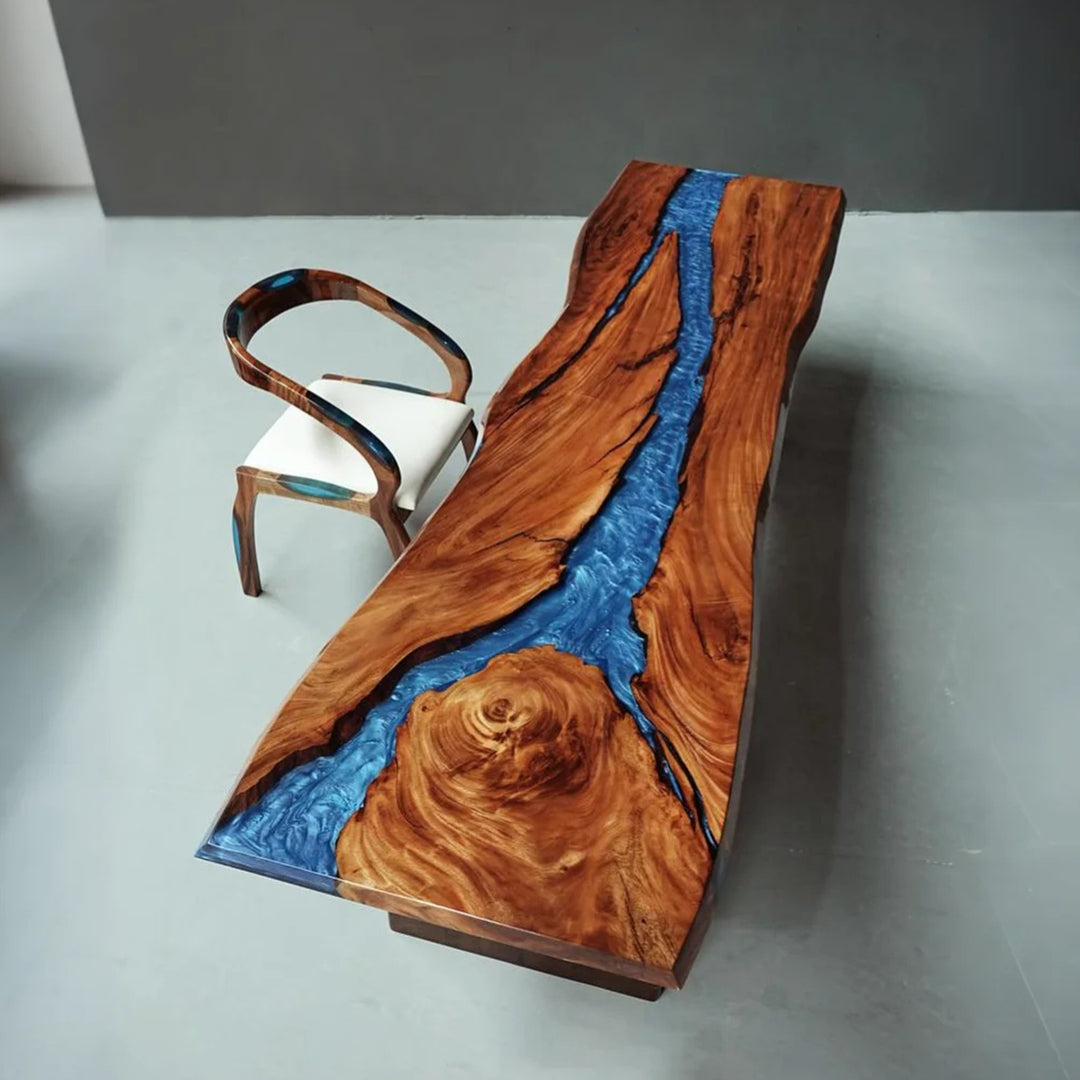 Artisan black walnut dining table with ocean-blue resin center