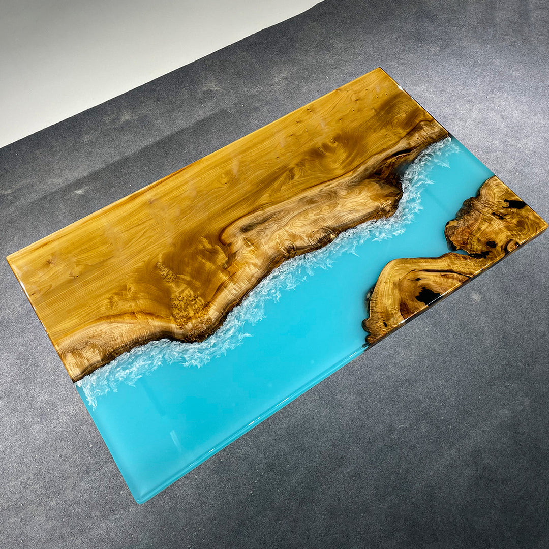 Modern conference table with live edge camphor and ocean resin inlay