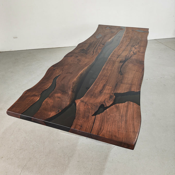 Unique epoxy table design featuring walnut slabs and live edge lumber