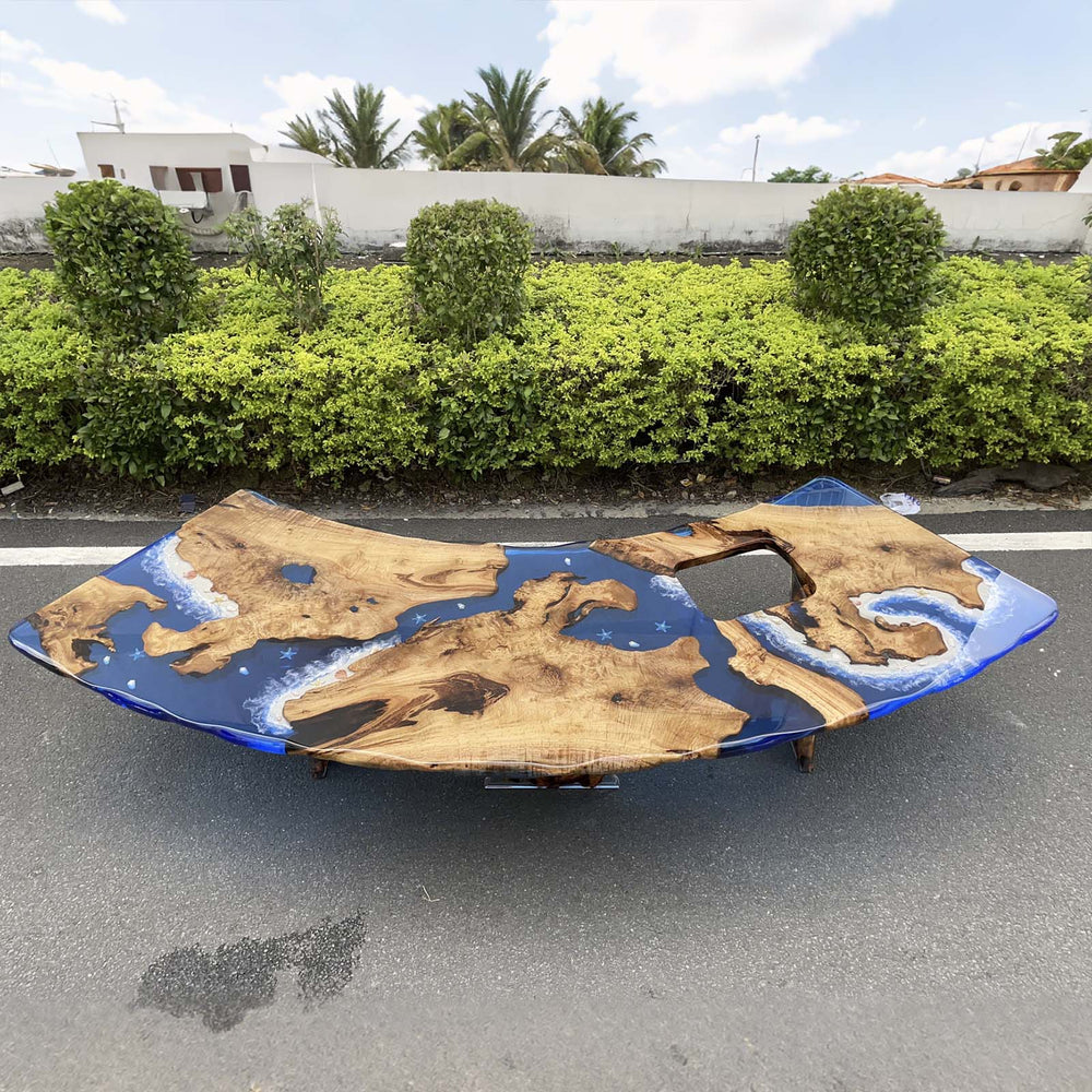 Curved epoxy river table with live edge wood top Florida coastal style