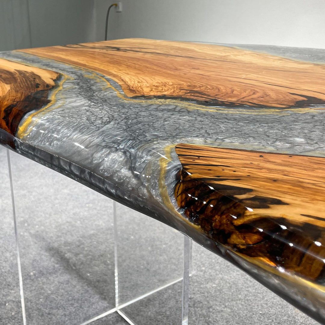 Epoxy river dining table featuring metallic silver resin flow