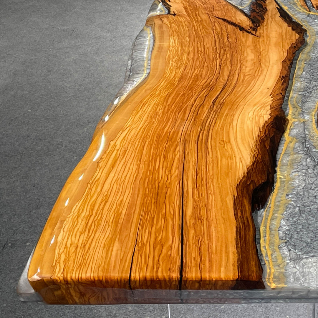 Elegant live edge wood and epoxy table with mirror-like polish