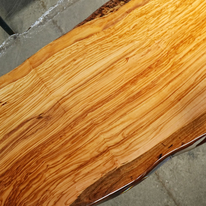 Oversized olive epoxy resin dining table for elegant interiors