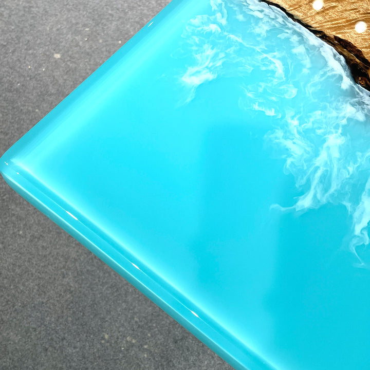 High gloss epoxy table top in Ocean Serenity blue with golden camphor