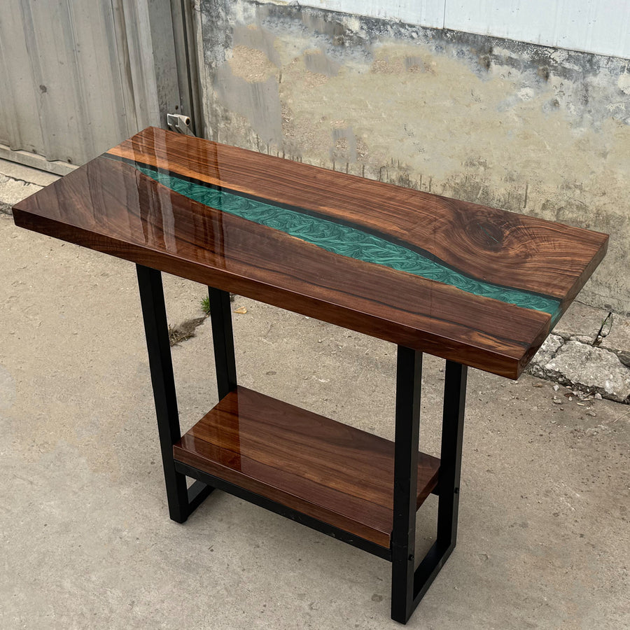 Stylish epoxy resin table for entryway with turquoise resin detail.