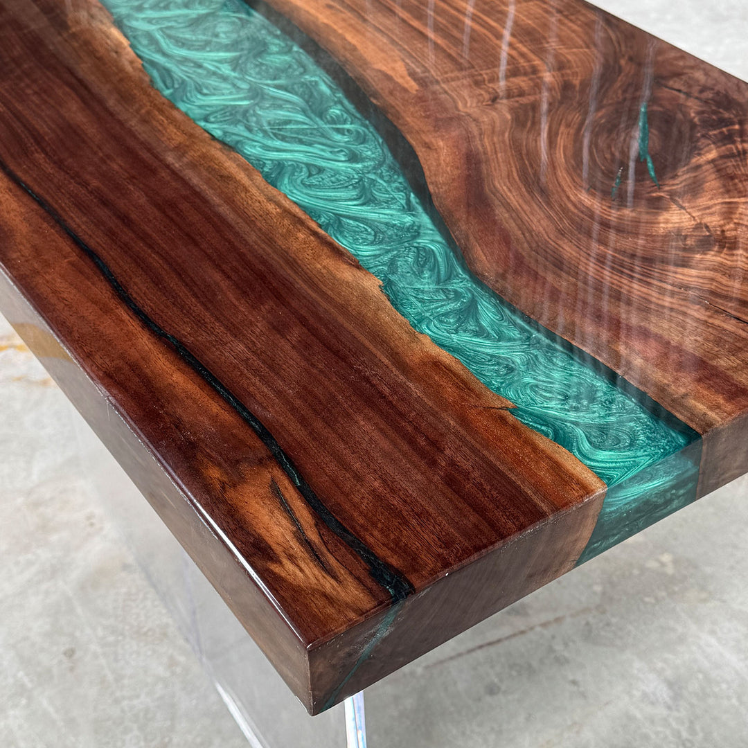 Handcrafted resin river table with walnut wood for modern interiors.