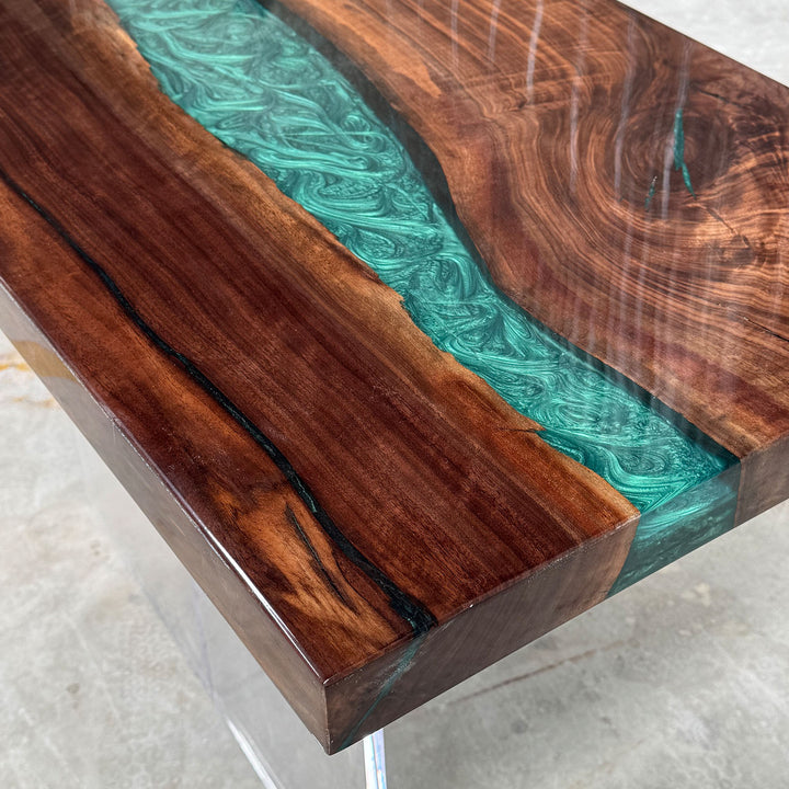 Handcrafted resin river table with walnut wood for modern interiors.