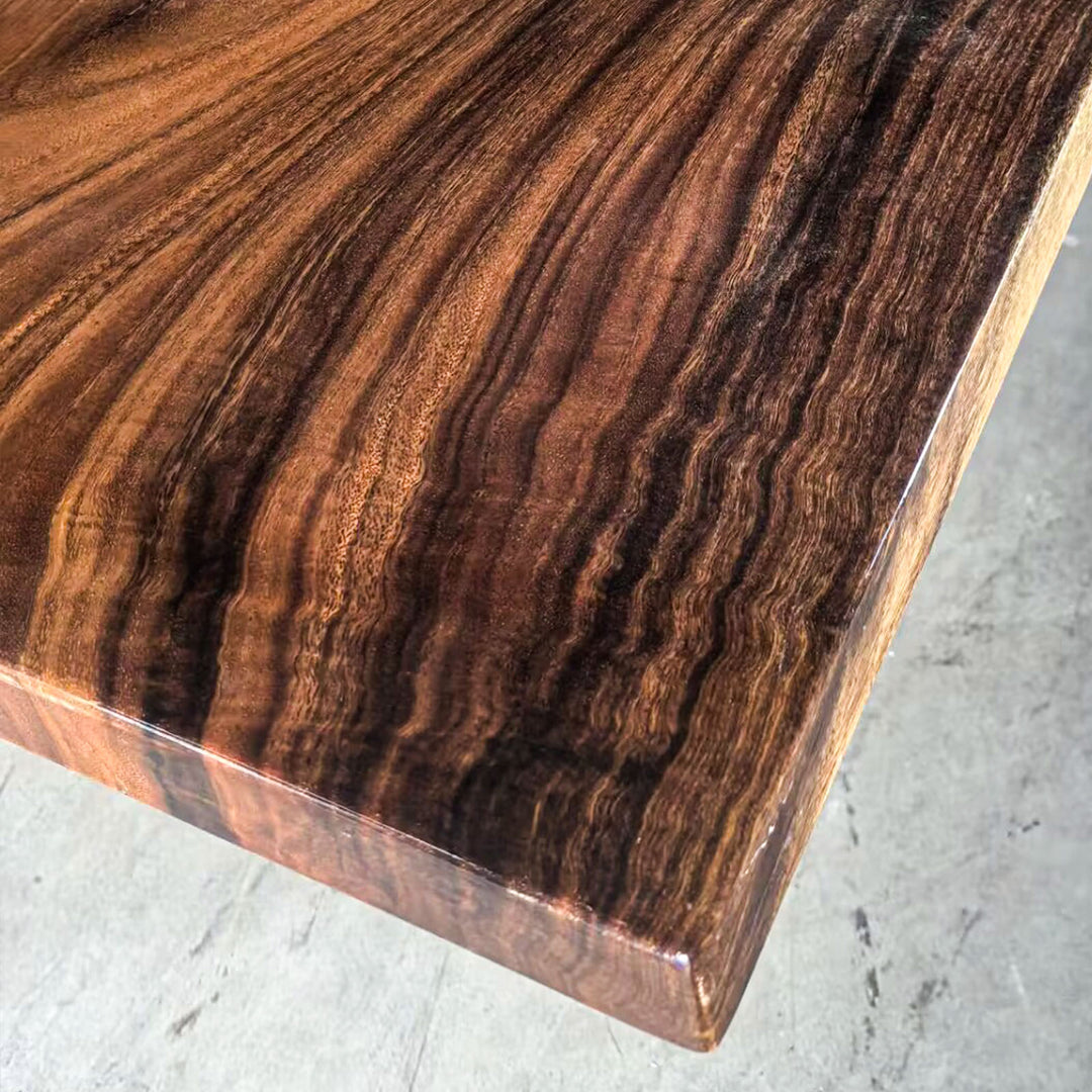 Epoxy resin and walnut wood dining table for open living space