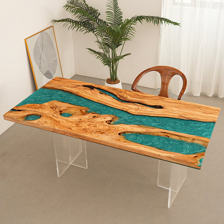 Modern epoxy table made from olive wood and ocean blue resin