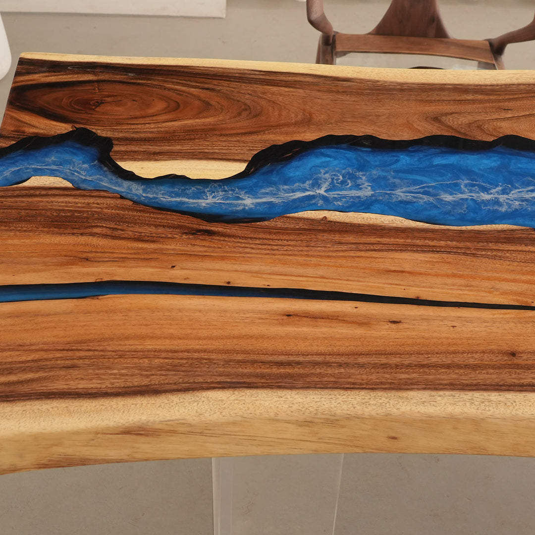 Seawavetable-Modern interior with artistic epoxy river table + brown leather chairs