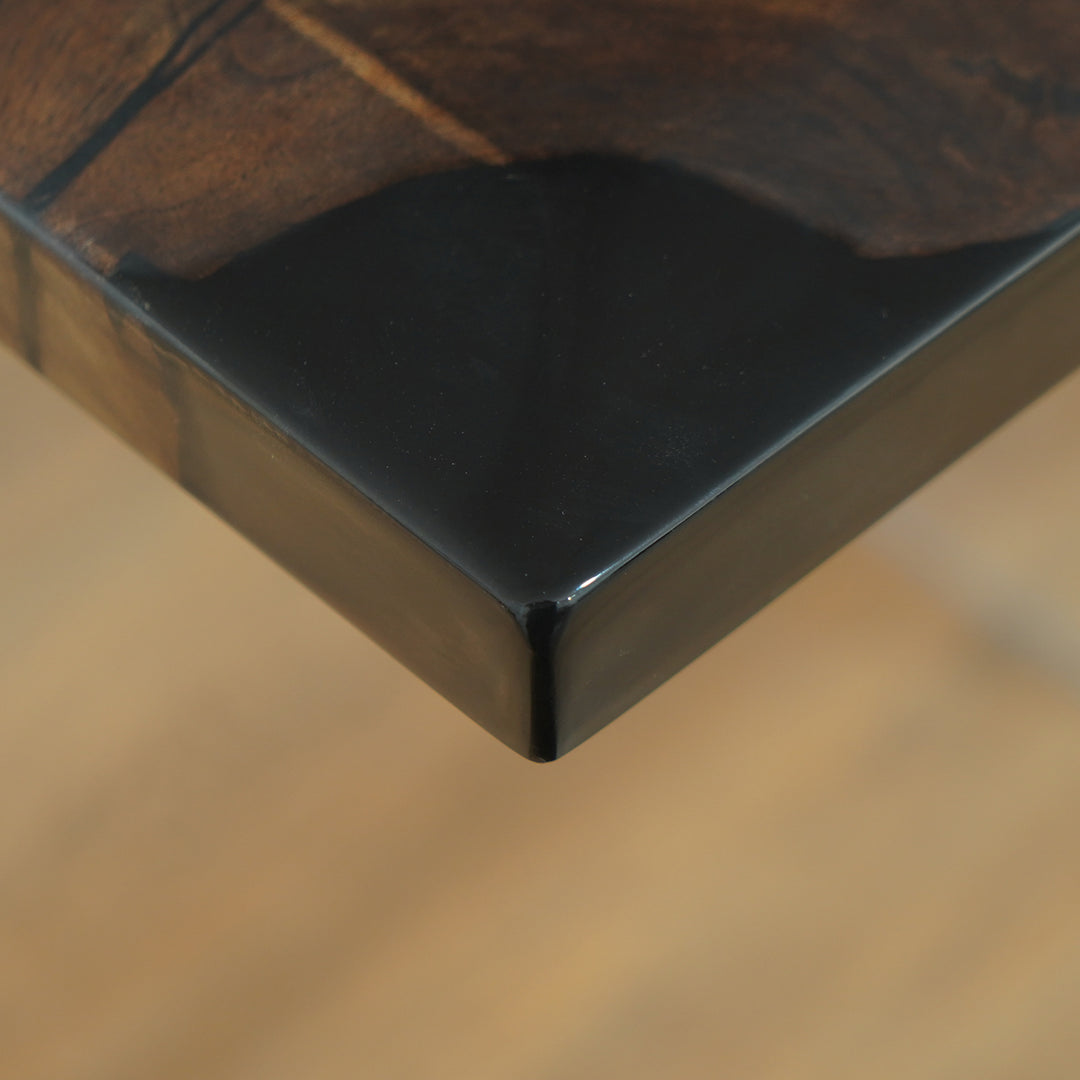 Seawavetable-Close-up of luxury black walnut grain and epoxy river detail