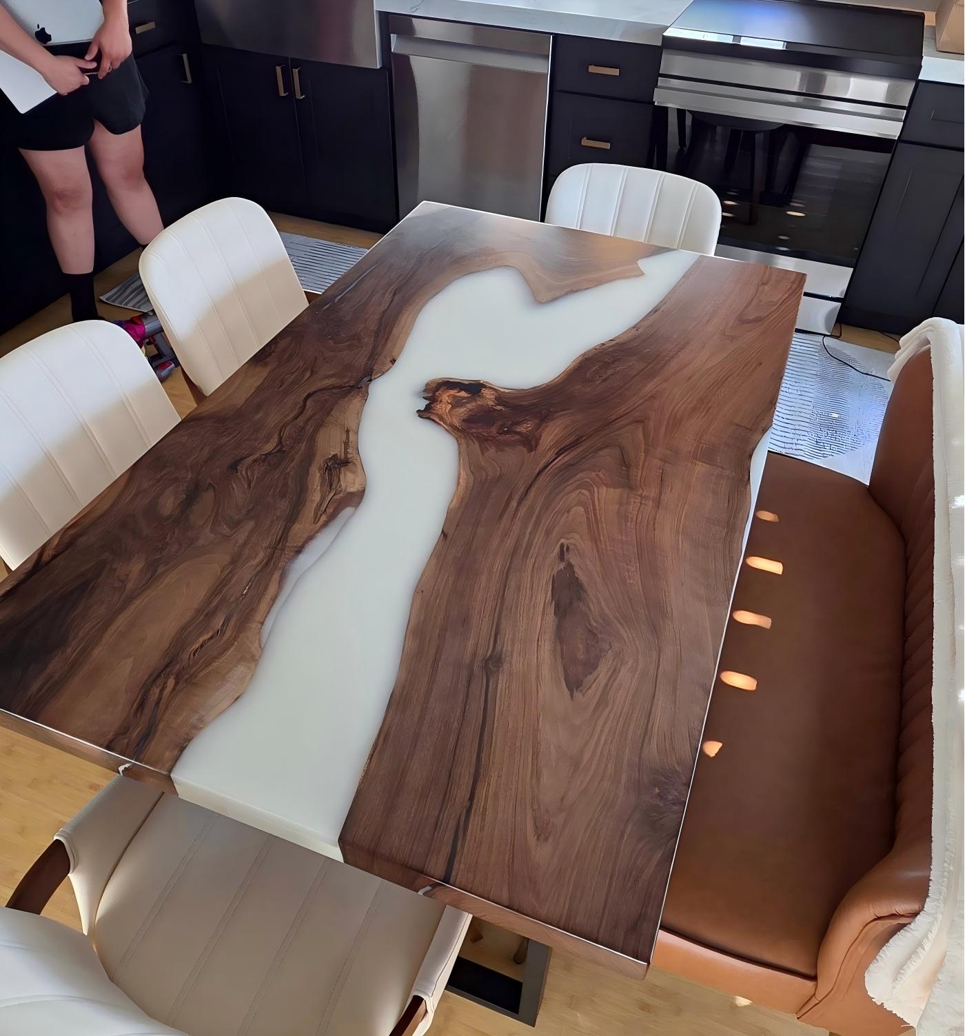 Black walnut and white epoxy dining table with matte finish, styled in a contemporary dining space — handcrafted custom epoxy furniture.