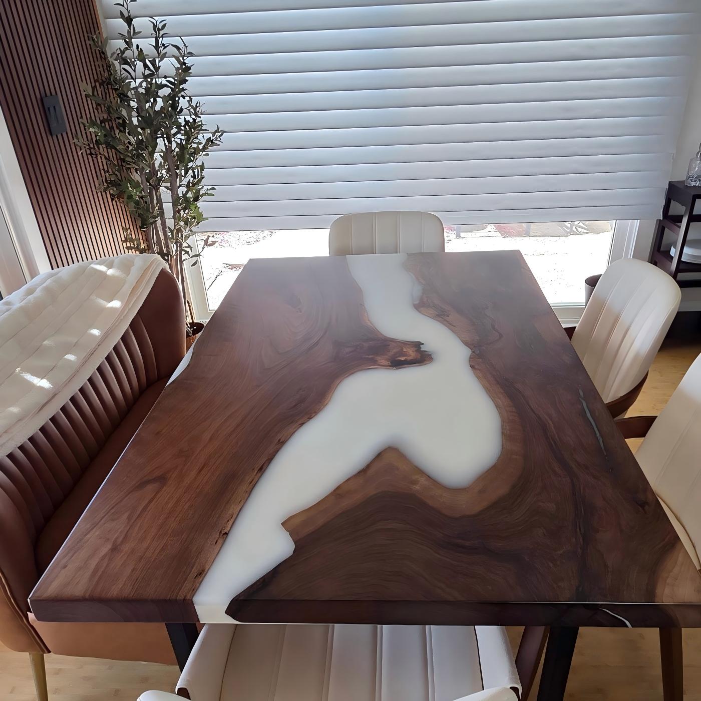 Angled view of black walnut white epoxy river table with straight edge and soft matte surface, perfect for a modern minimalist home.