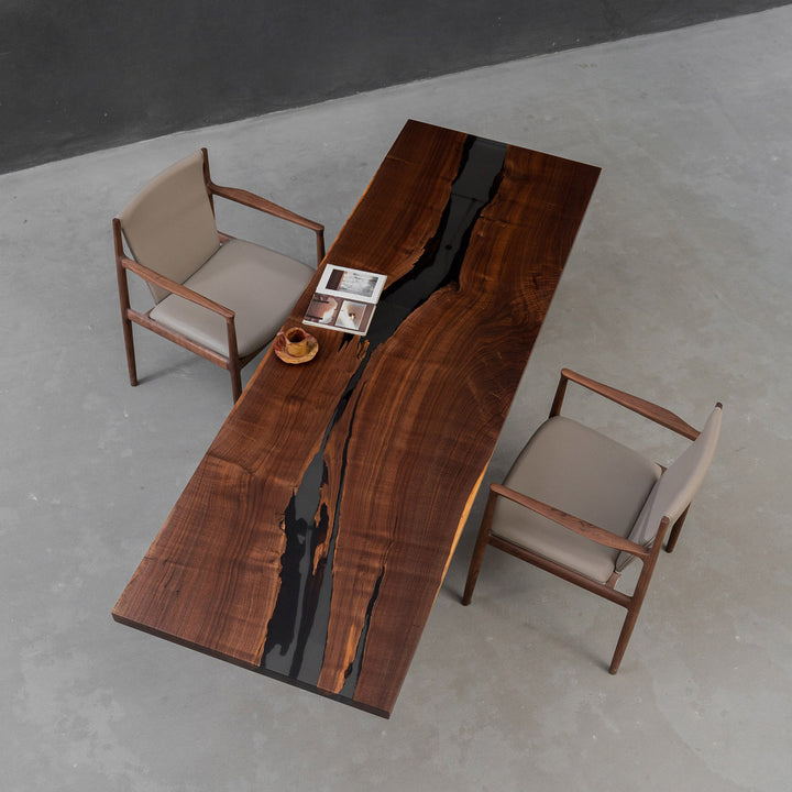 Custom corporate conference table with translucent black epoxy top and full matte surface finish