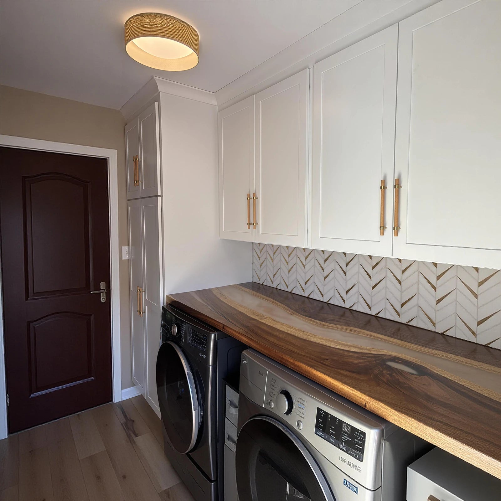 Custom walnut and Lunar Silk resin shelf by SeawaveTable installed in Mark Deming’s laundry room in York South Carolina