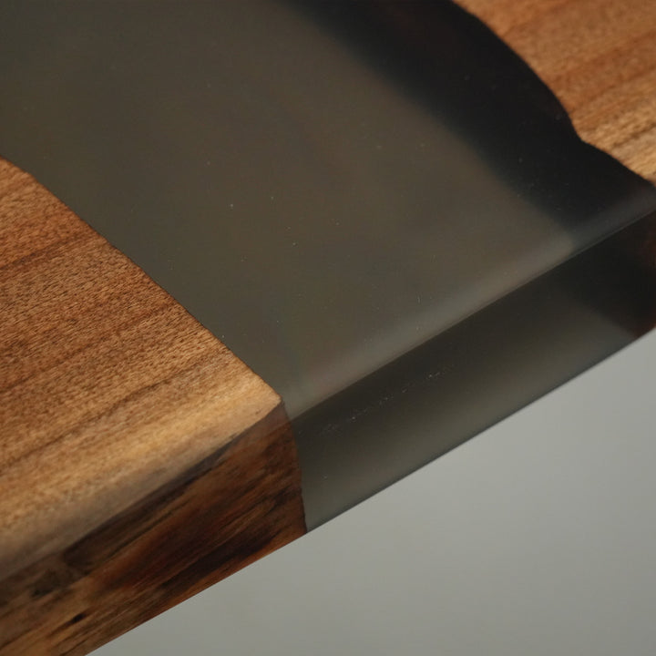Custom wood slab conference table with resin river and polished finish
