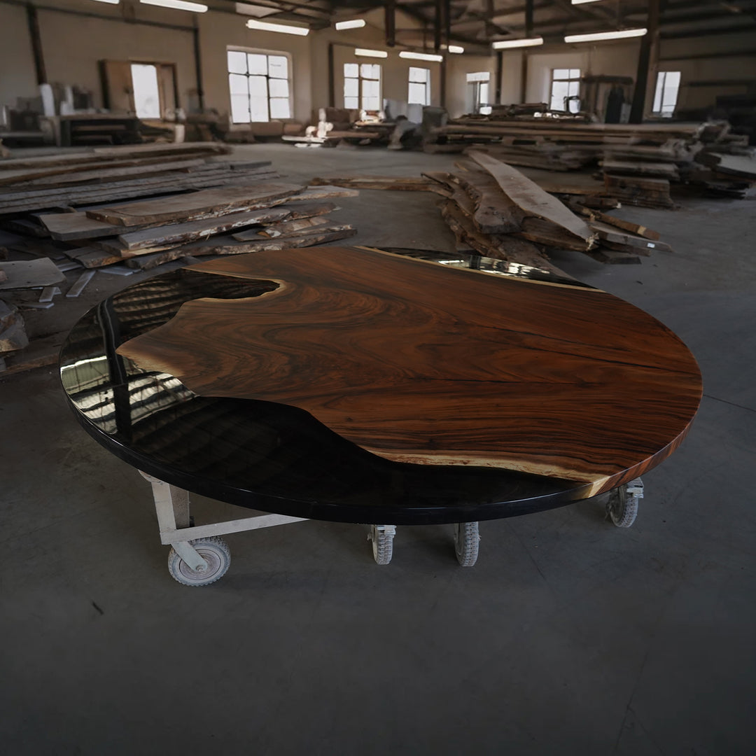 Live edge black walnut round epoxy dining table crafted for timeless Boston interiors