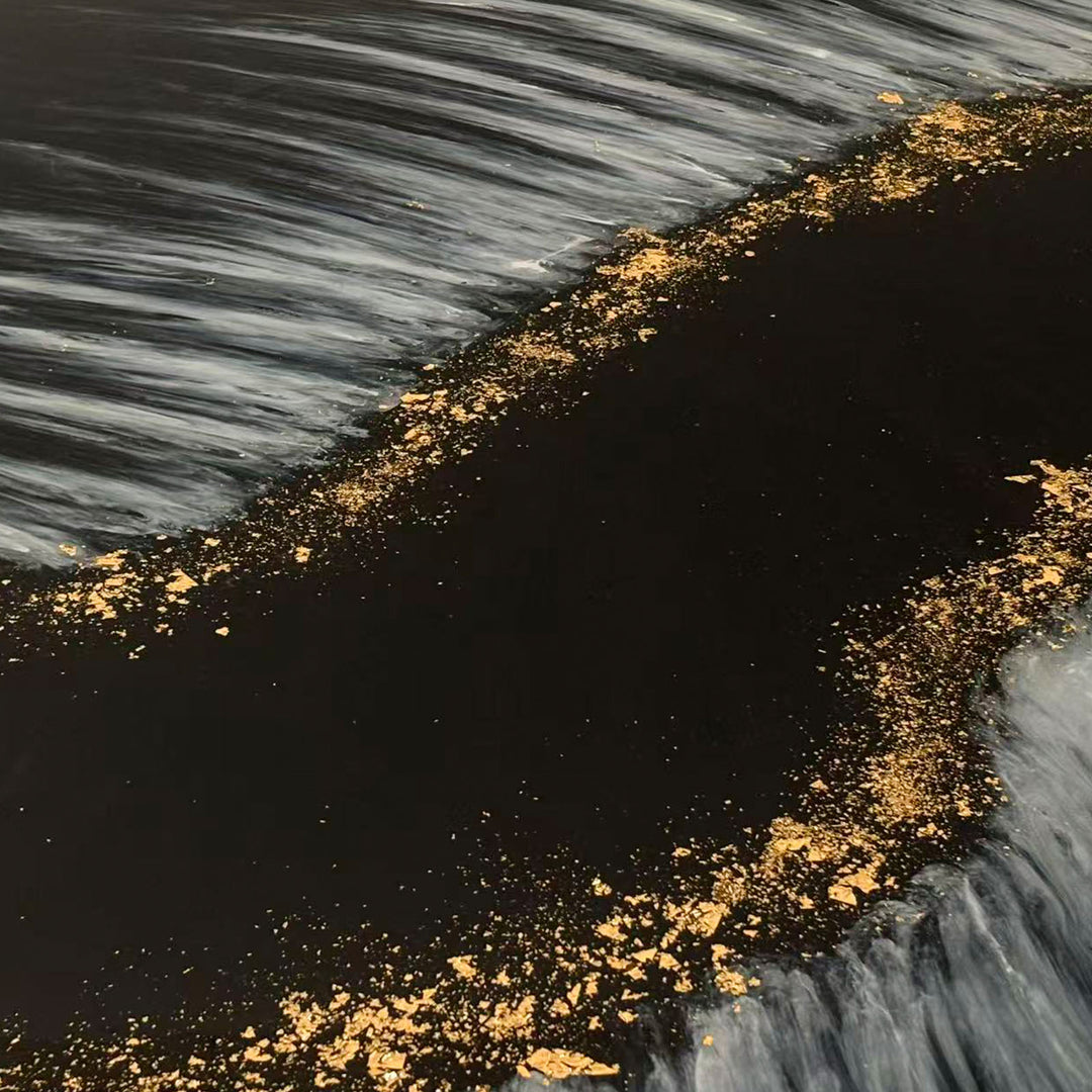 Round walnut epoxy river table with black resin and artistic white wave details