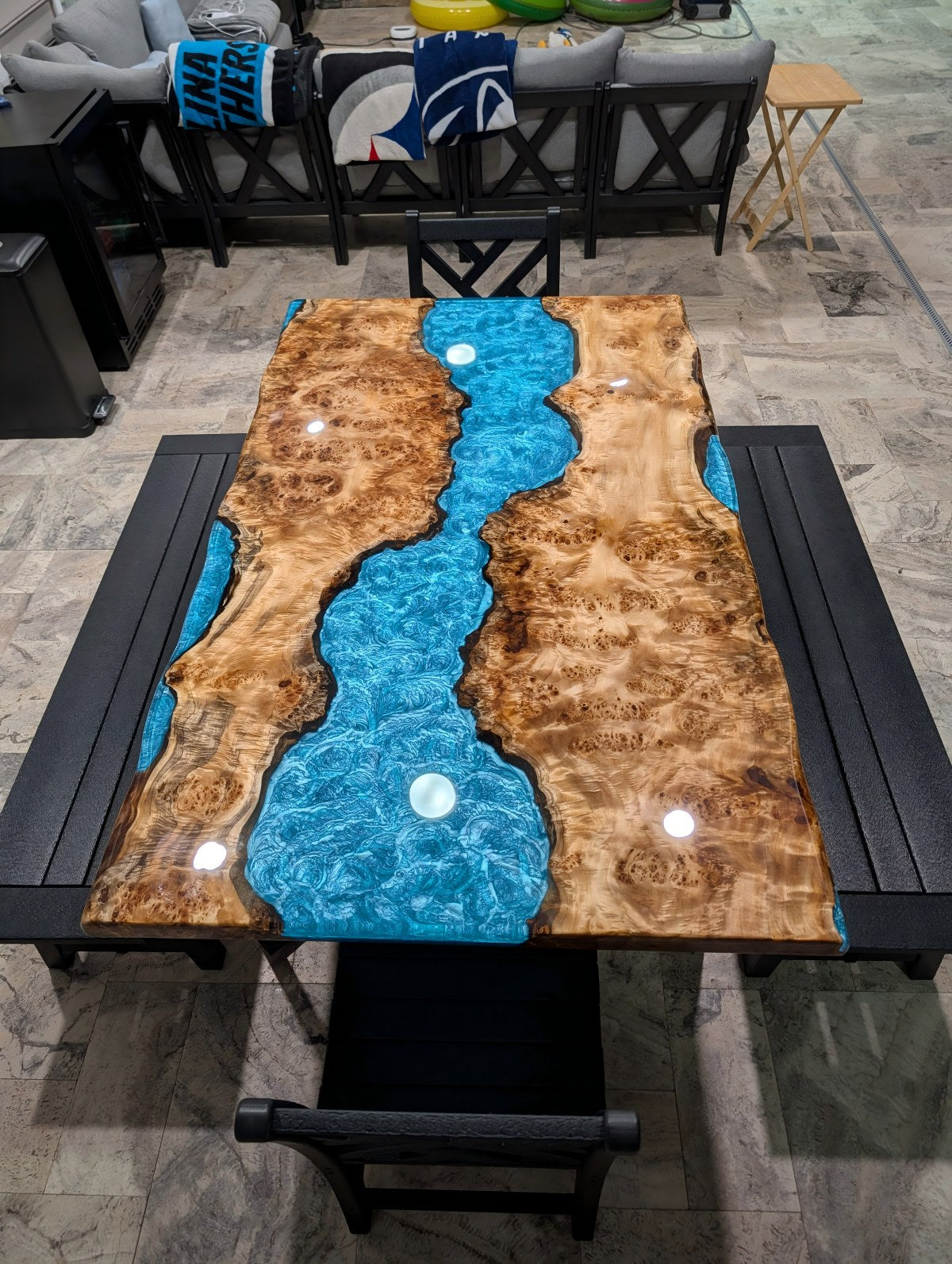 Custom resin color matched to pool water, shimmering under sunlight.