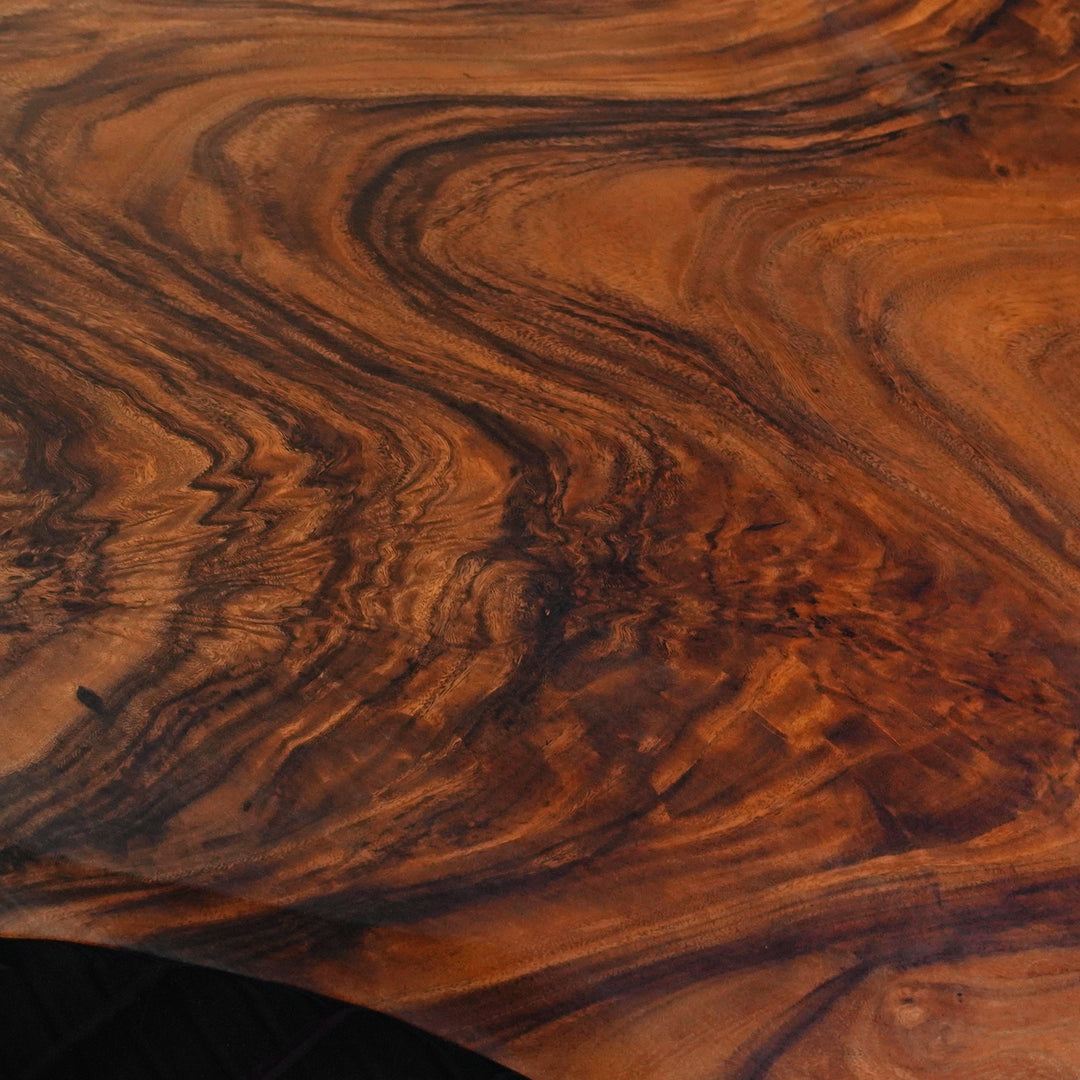 Modern walnut and black resin round dining table ideal for contemporary San Francisco homes
