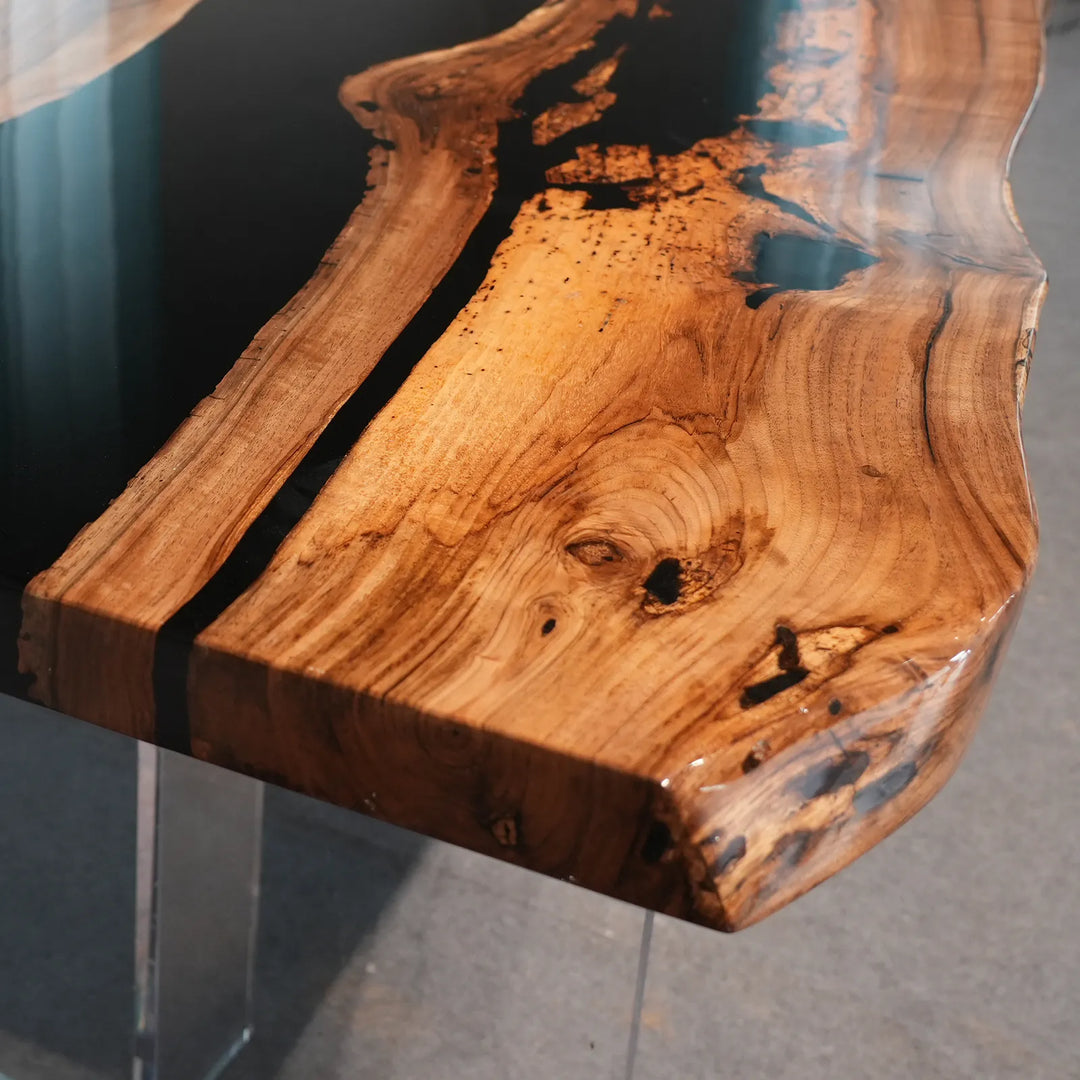 Natural Black Walnut grain beside glossy black epoxy by SeawaveTable