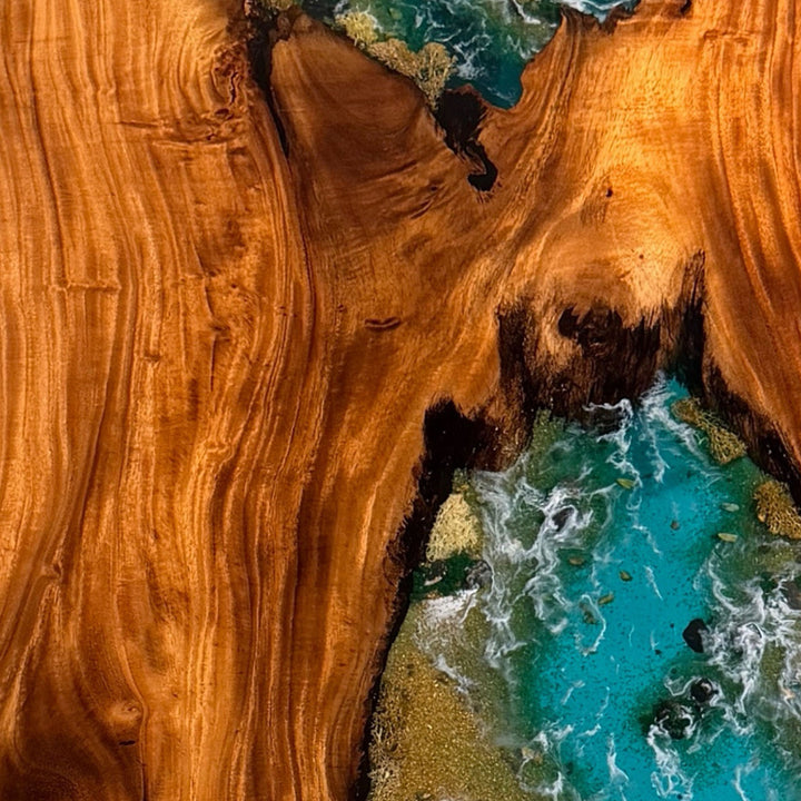 Two-inch thick walnut resin river table showing solid construction and handcrafted quality