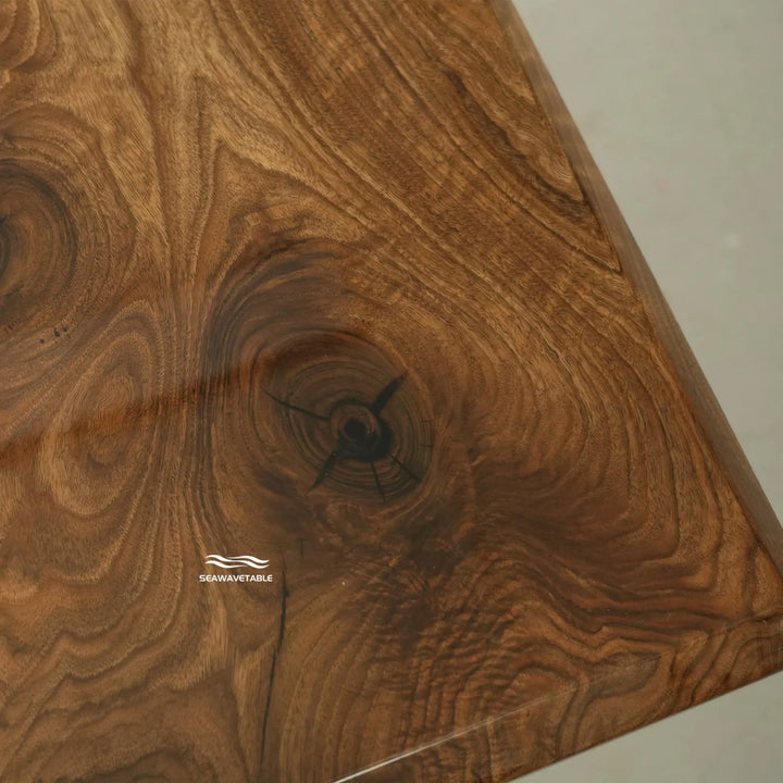 Large handcrafted black walnut river dining table for contemporary interiors