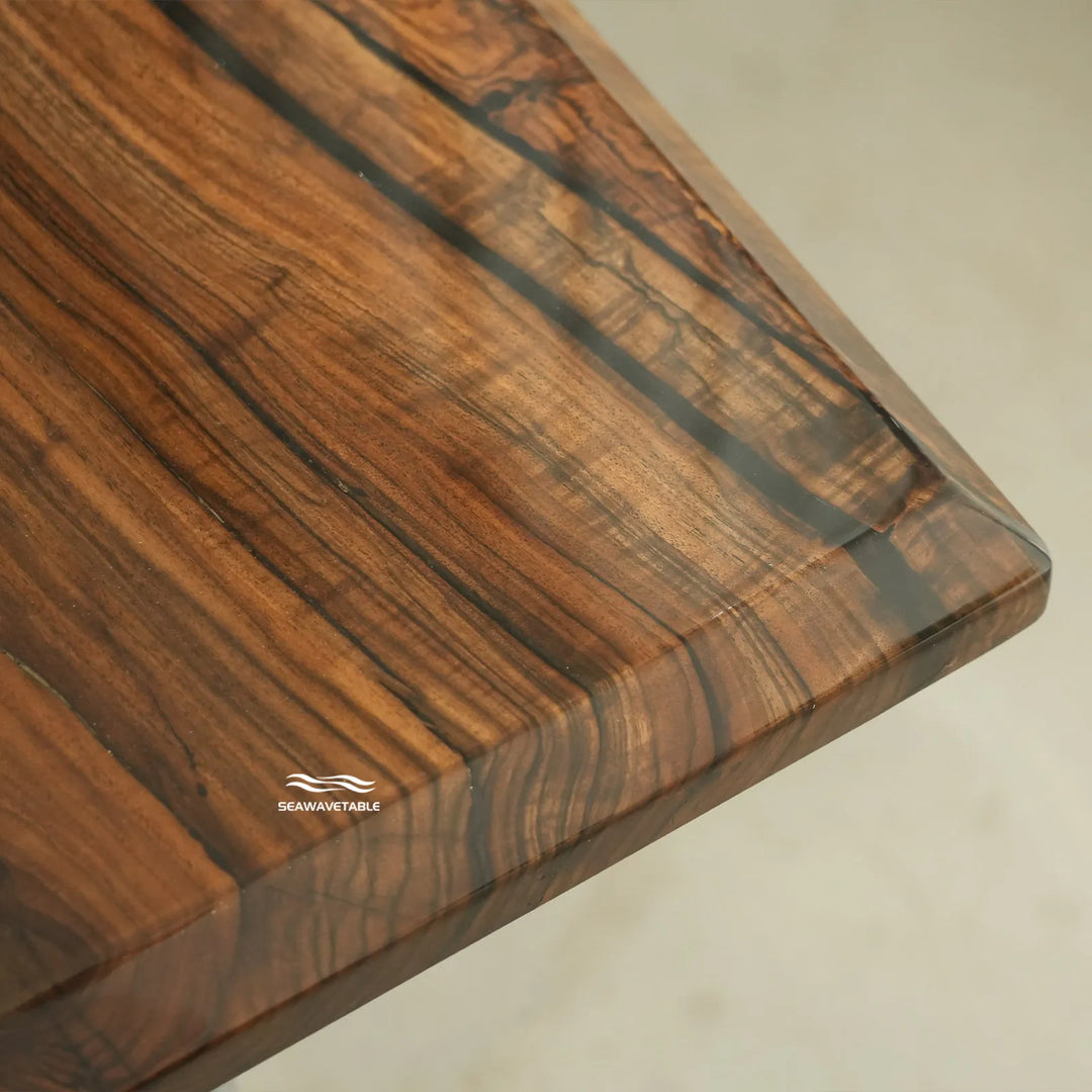 Modern mountain style black walnut resin dining table with warm wood tones