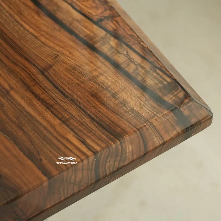 Modern mountain style black walnut resin dining table with warm wood tones