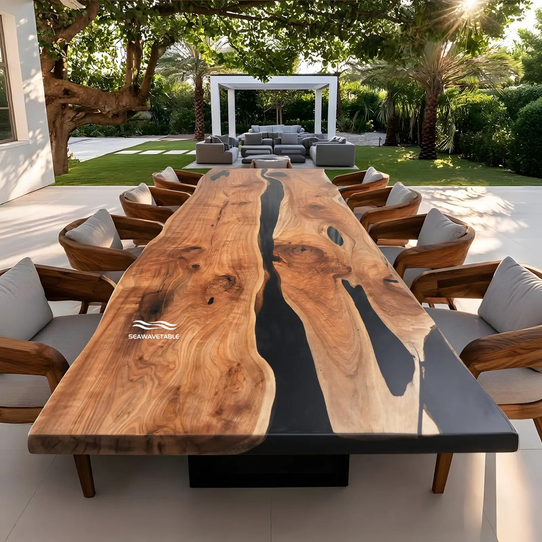 Handcrafted black walnut dining table featuring a flowing black translucent epoxy river design.