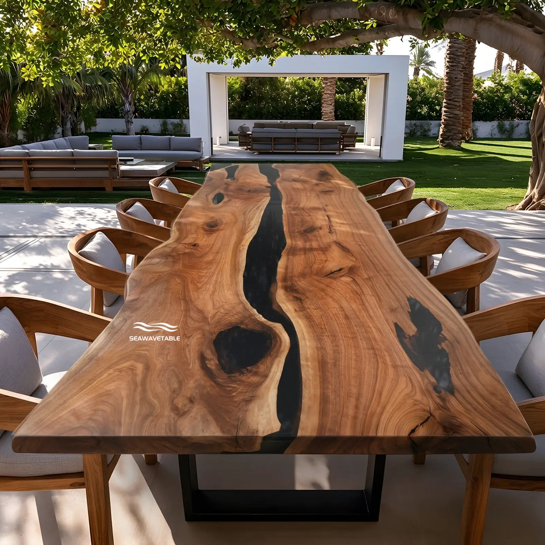 Large solid black walnut slab dining table with natural live edges and distinctive wood grain patterns.