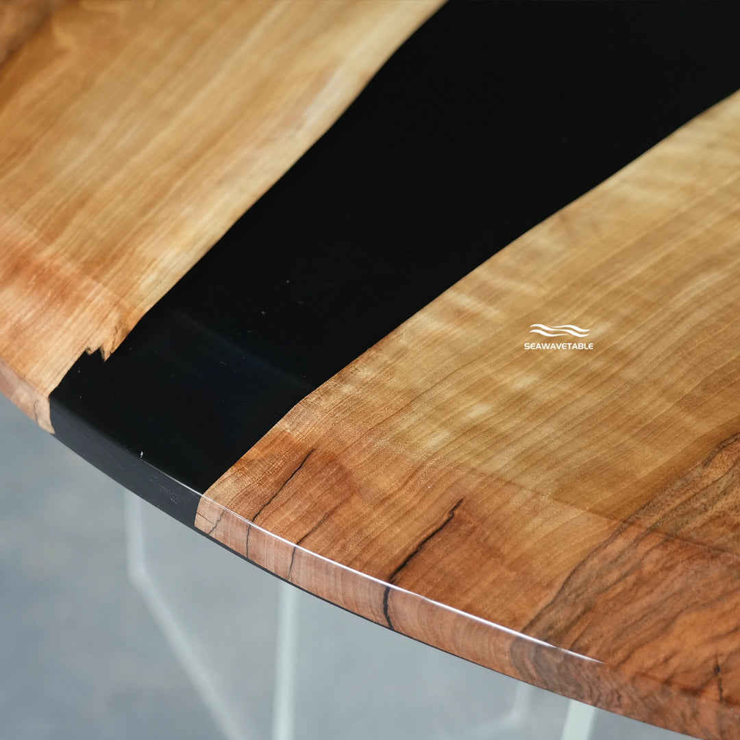 Detailed view of a wooden coffee table table top featuring black walnut texture and smooth resin craftsmanship - SeaWaveTable