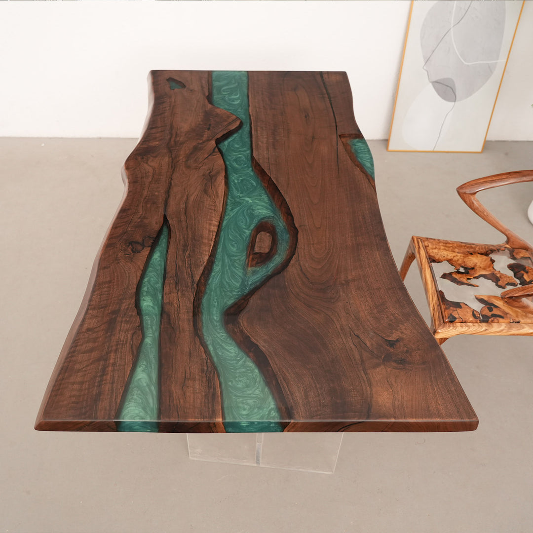 Custom black walnut epoxy resin river table with a natural wood slab