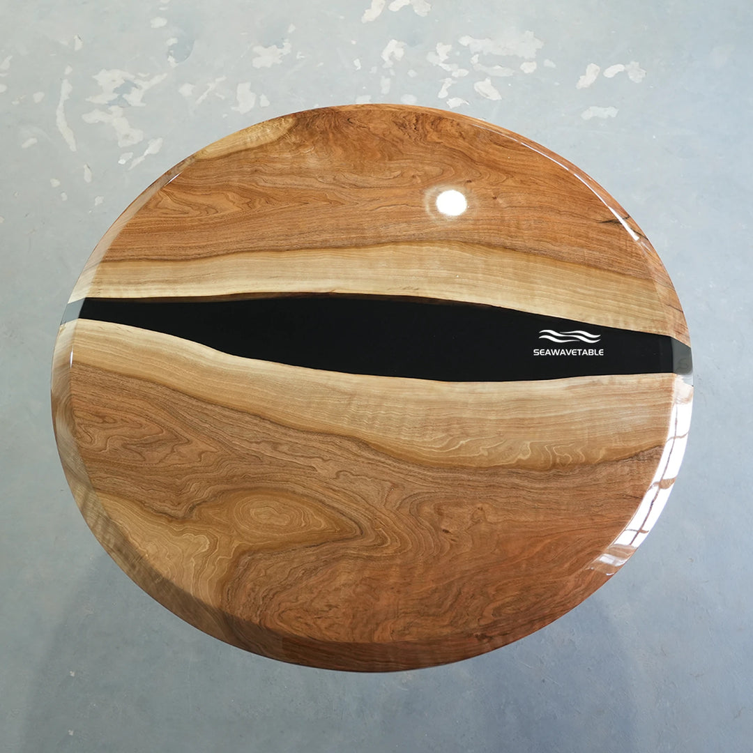 Resin black walnut coffee table display featuring a handcrafted wooden coffee table with a distinctive epoxy table top design - SeaWaveTable