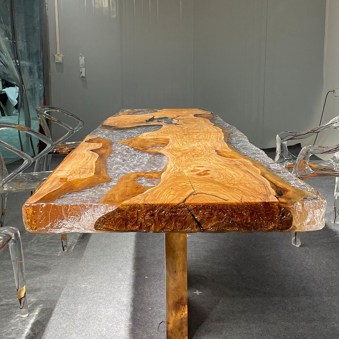Olive wood and resin table with transparent chairs