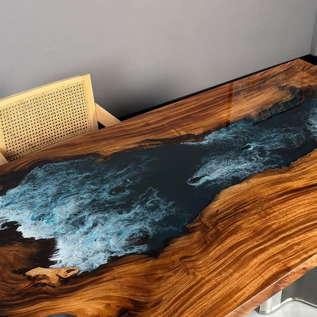 Side view of the custom resin river table with ocean blue tones