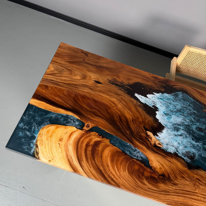 Ocean-themed tabletop featuring fish and flowing resin design