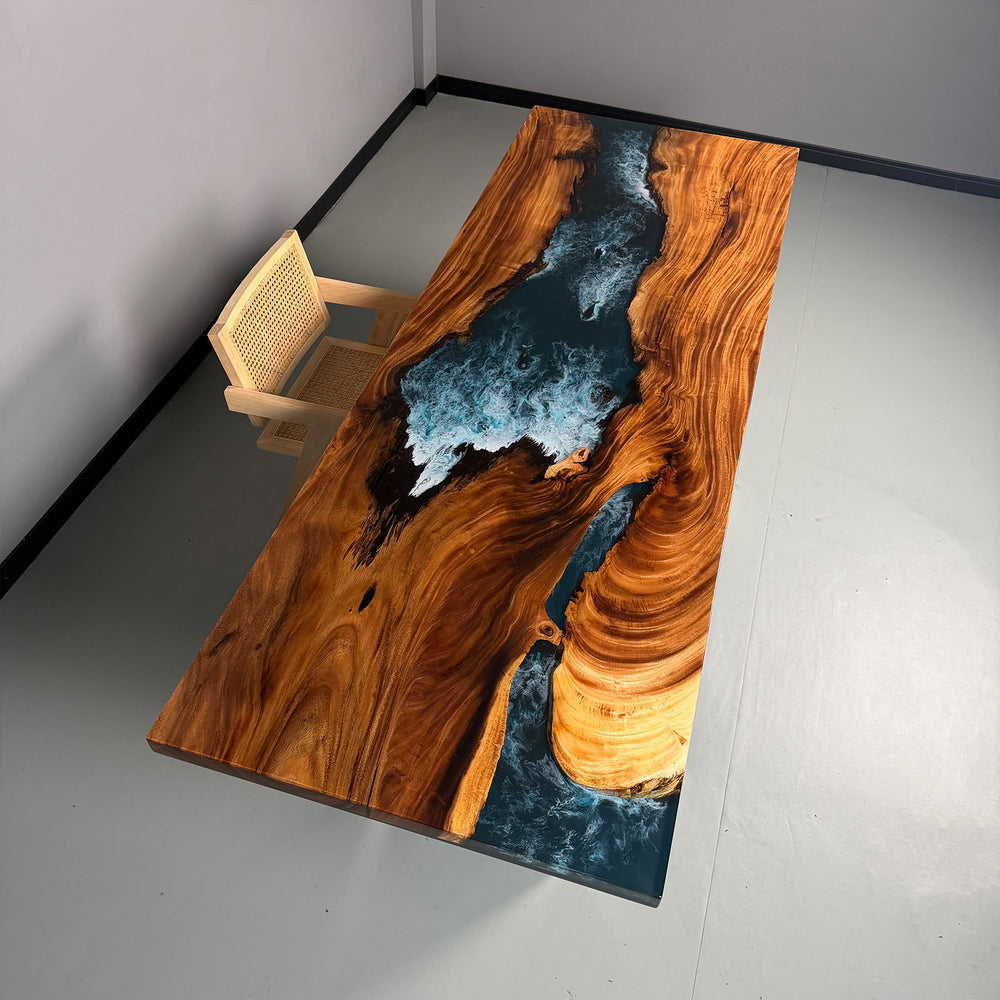 Ocean wave resin effect with deep navy and translucent highlights.