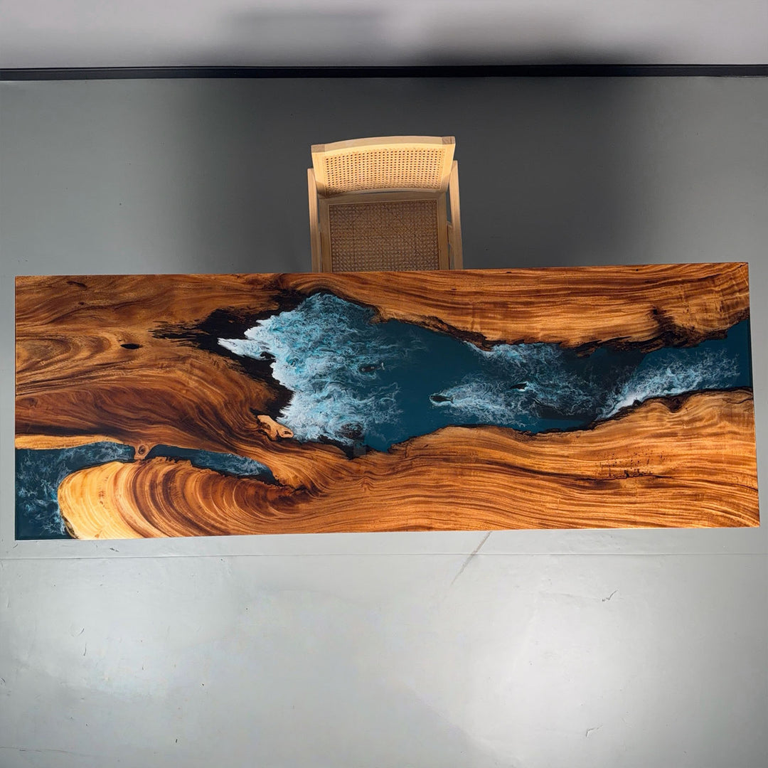 Center resin river section with ocean-inspired flow and fish elements