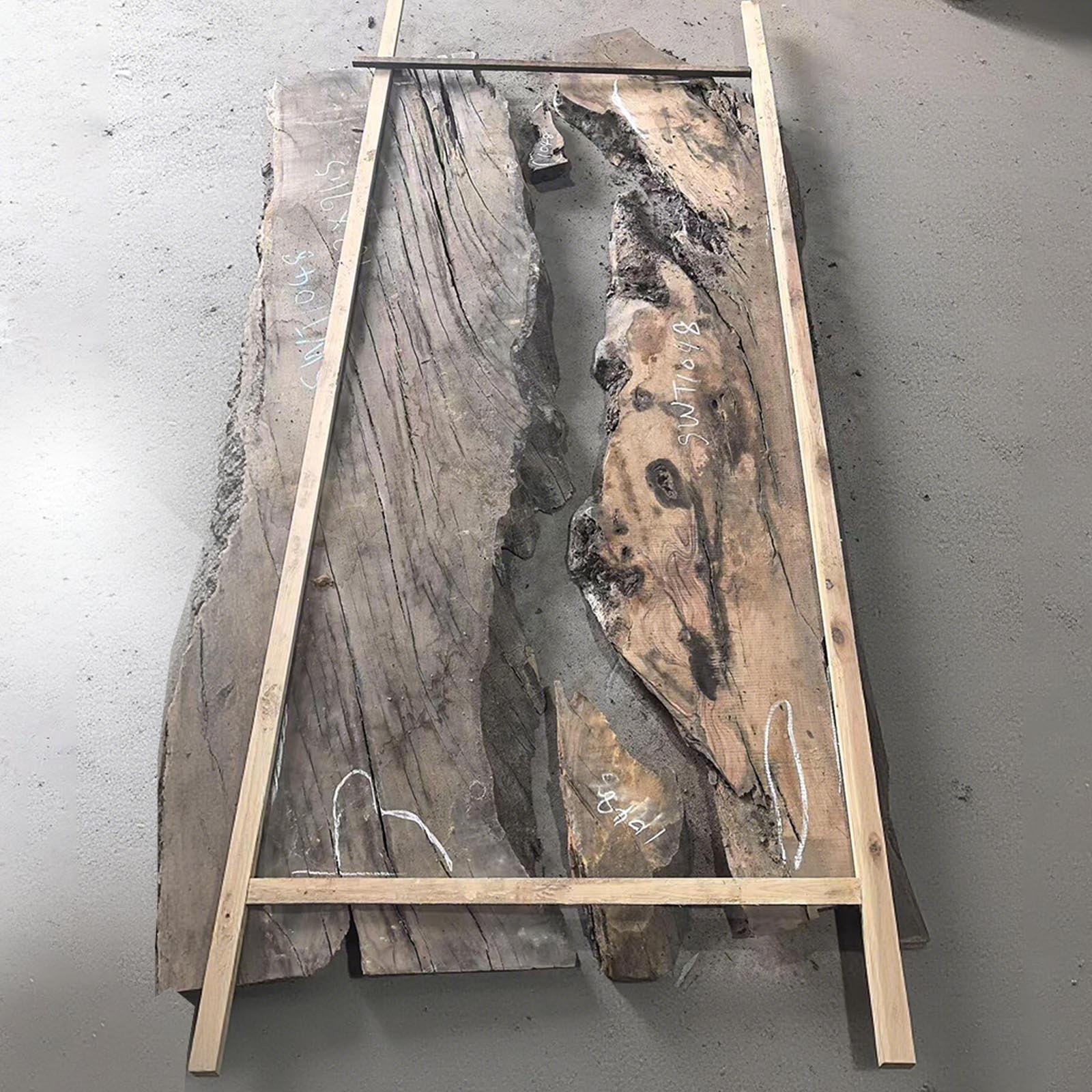 Top view of solid olive wood dining table with Mystic Lagoon resin river, showcasing natural wood grain and flowing resin.