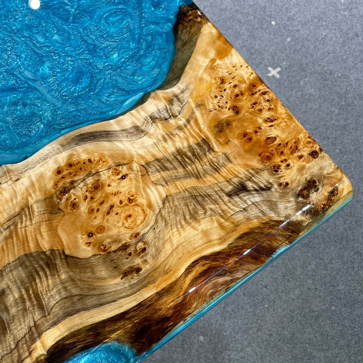 Poplar burl epoxy table with ocean-inspired blue resin details