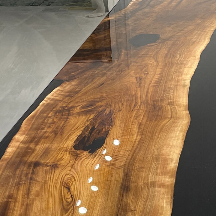 Professional boardroom table with power outlets and modern industrial design