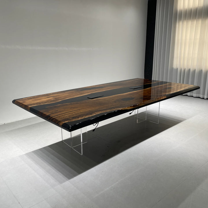 Contemporary office table with black resin river and charging ports