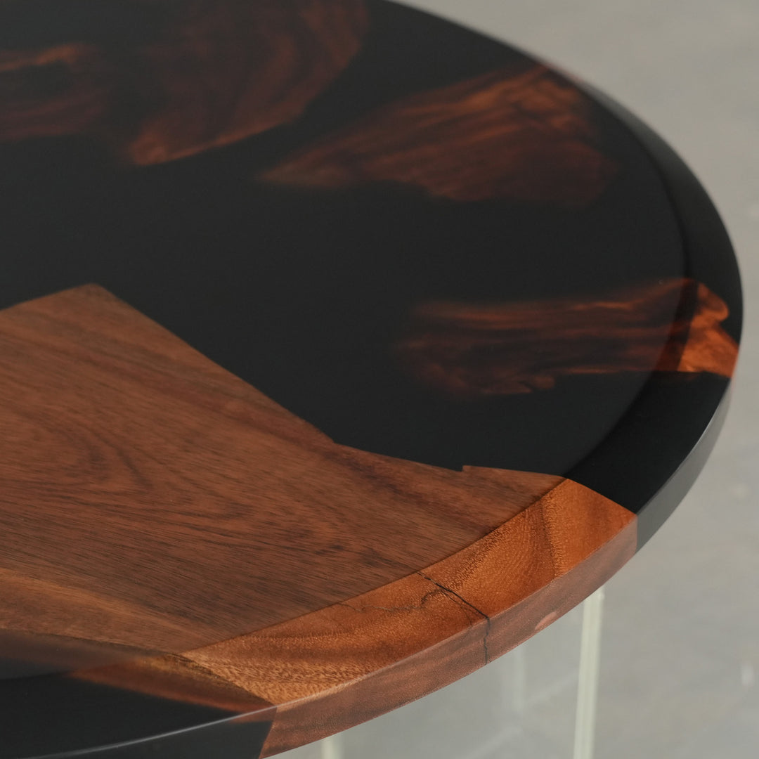 Black epoxy resin round table with premium walnut slabs