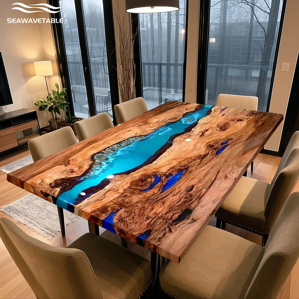 Custom wooden river table with clear blue epoxy and natural wood grain, surrounded by elegant dining chairs.