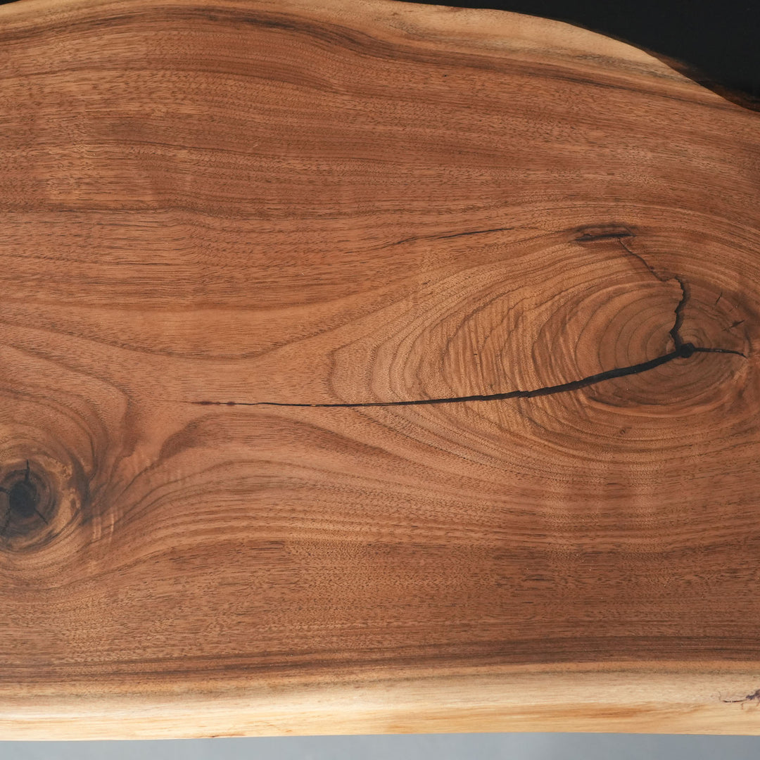 Close-up of a wooden surface with visible grain and texture