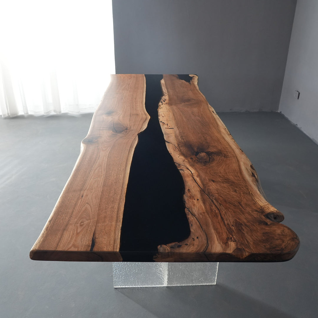 Elegant black walnut wood slab table with seamless resin river centerpiece