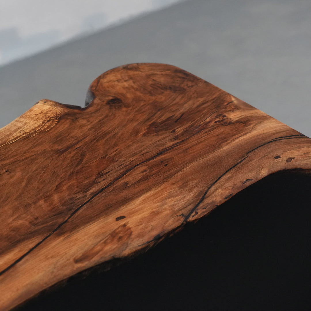 Close-up of a wooden surface with natural grain and texture 